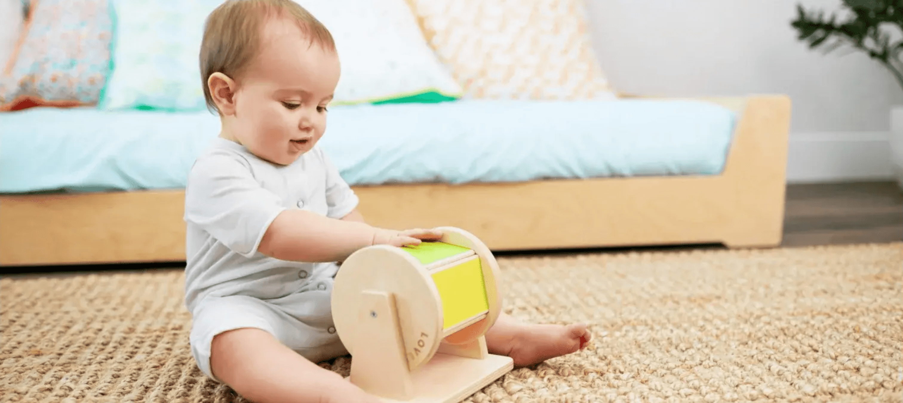 Child spinning the Spinning Rainbow from The Senser Play Kit